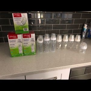 New bottle, never used with drop in slips